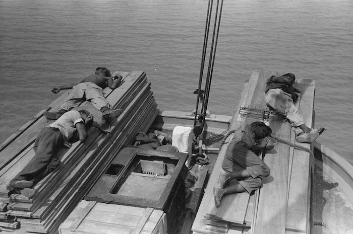 Stevedores sleeping on the Mississippi packet boat El Rito, by Lee Russell, September 1938. Library of Congress. Public Domain.
