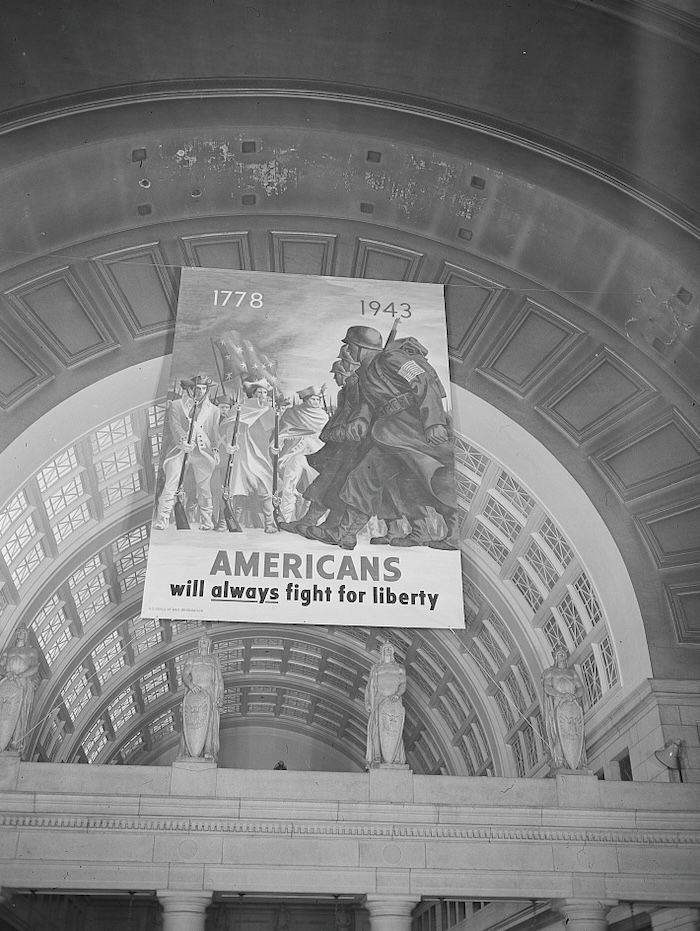 Office of War Information poster at Union Station in Washington, DC, Gordon Parks, March 1943. Library of Congress. Public Domain.