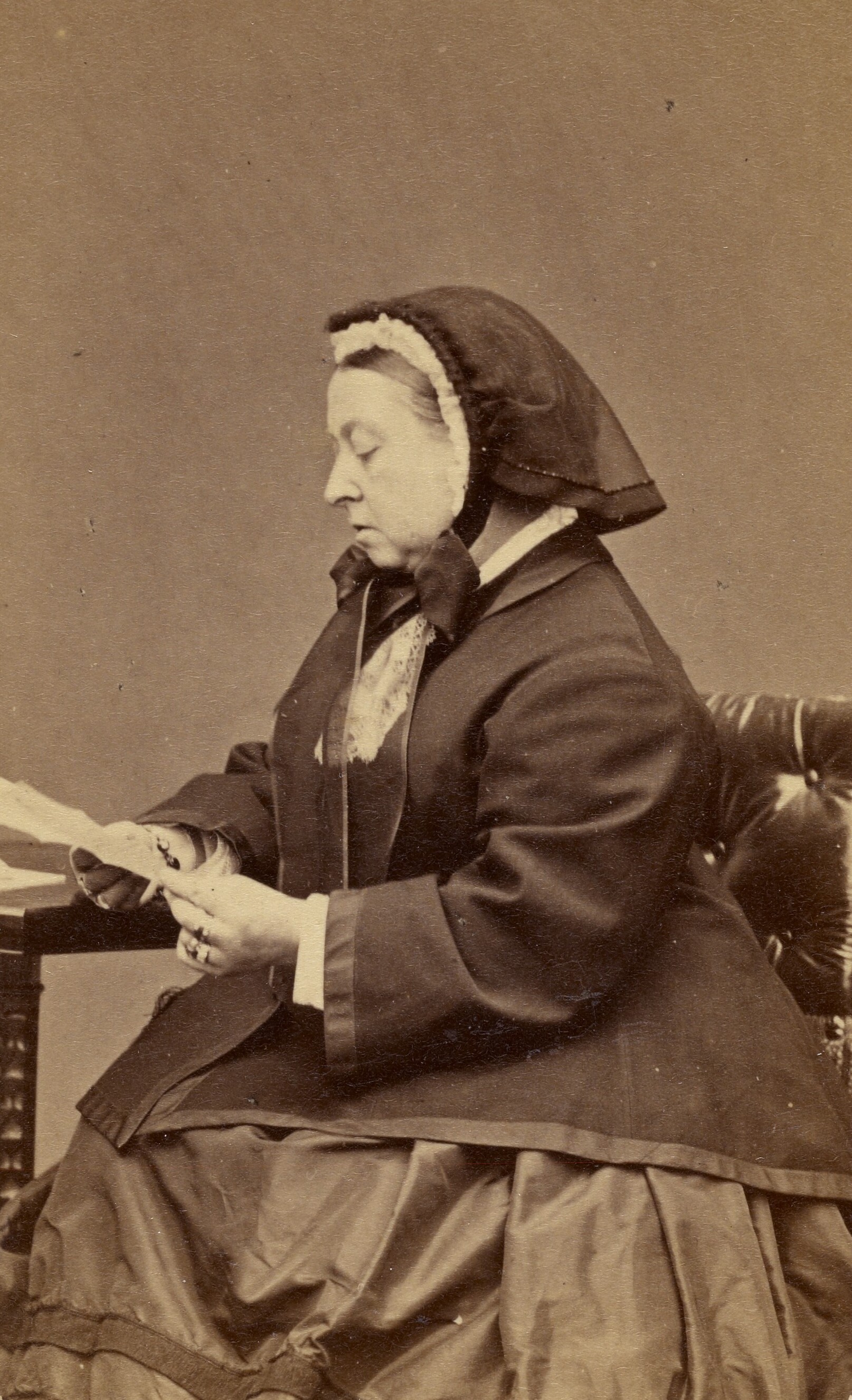 Queen Victoria photographed in the 1880s, wearing black. The J. Paul Getty Museum, Los Angeles. Public Domain.