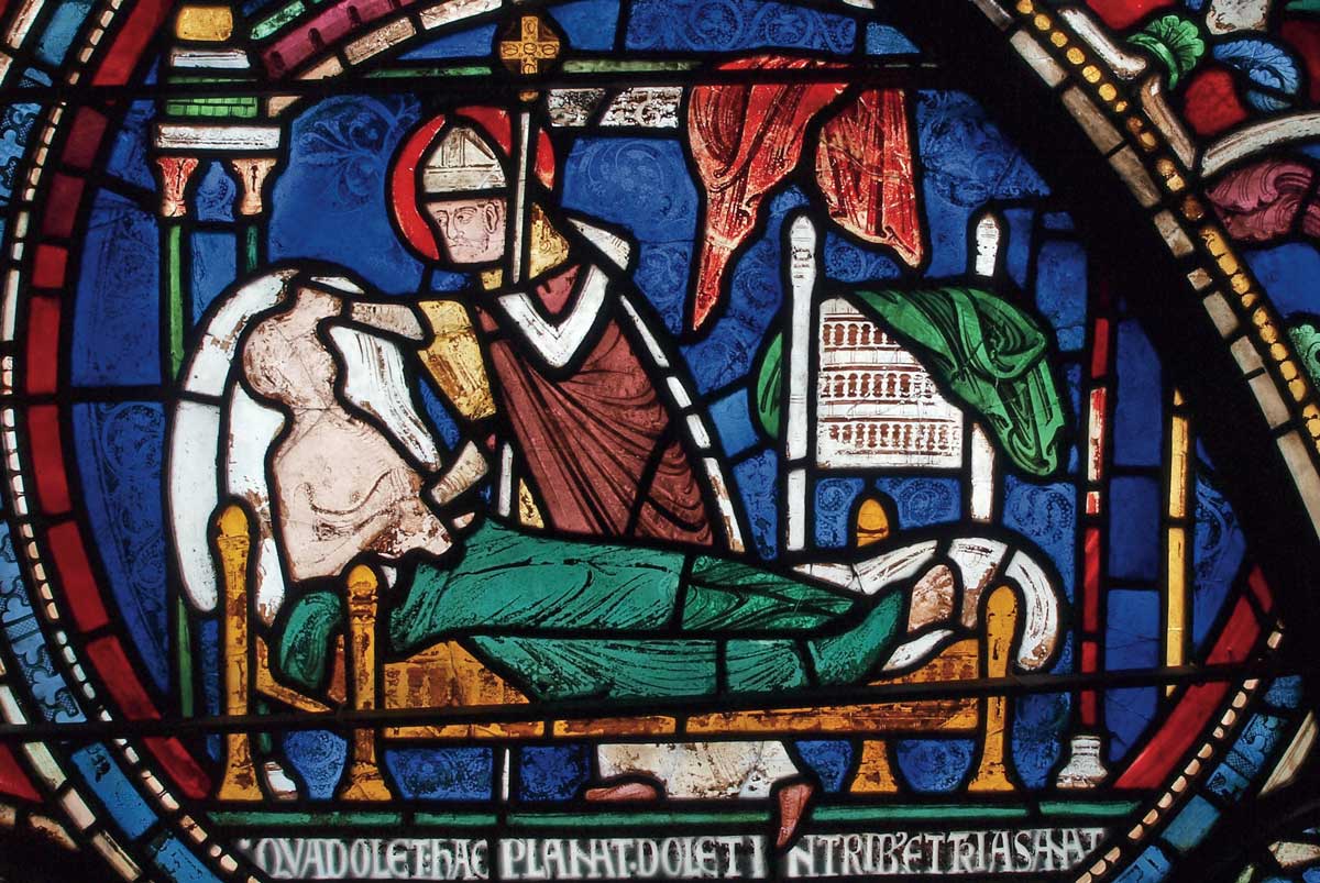 Saint Thomas Becket curing a man in his sickbed, stained glass window (detail), Canterbury Cathedral, early 13th century.