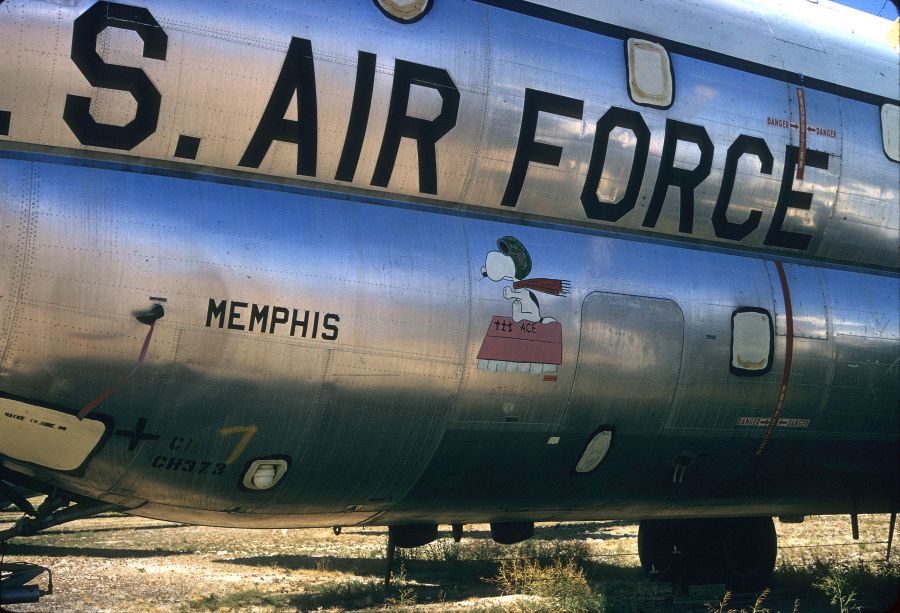 Snoopy’s Flying Ace adorns the fuselage of a U. S. Air Force Boeing C-97 Stratofreighter, c. 1970s. SDASM Archives. Public Domain.