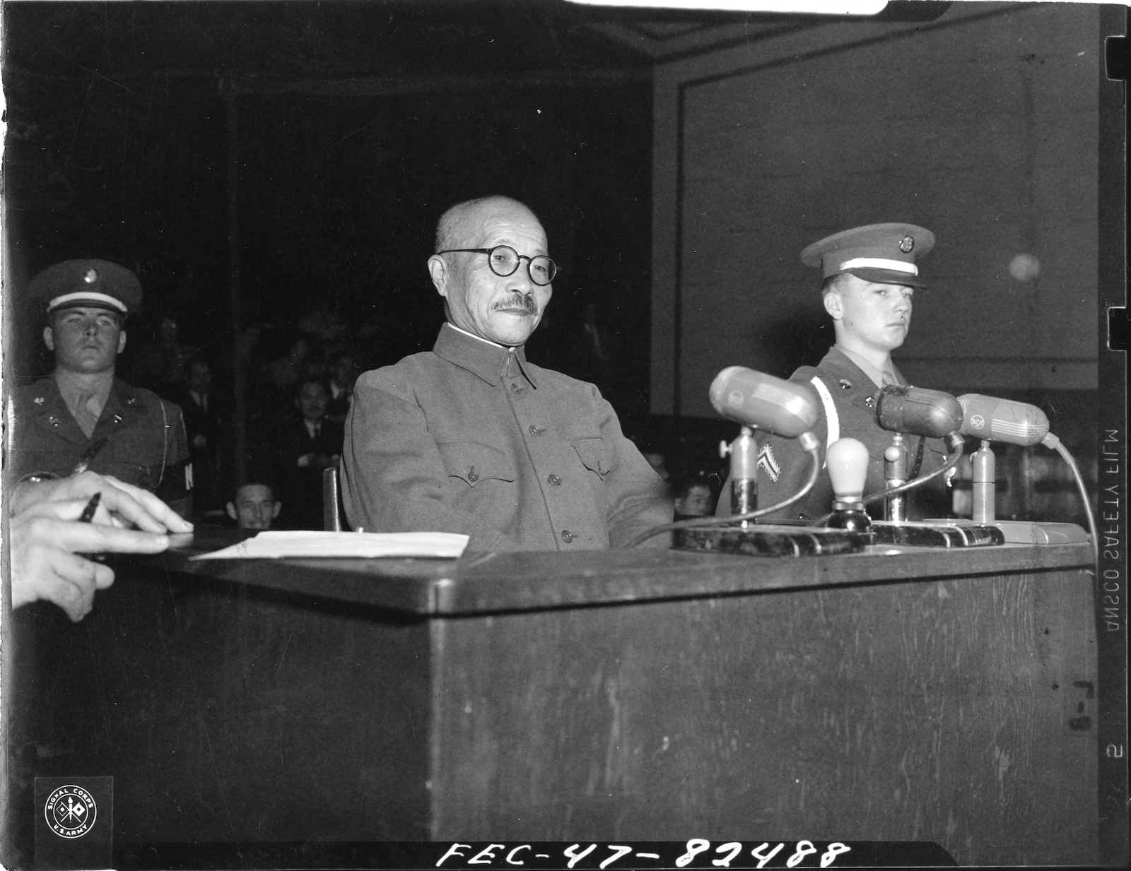 Tōjō Hideki in the witness box during the Tokyo trials, 26 December 1947. National Archives. Public Domain.