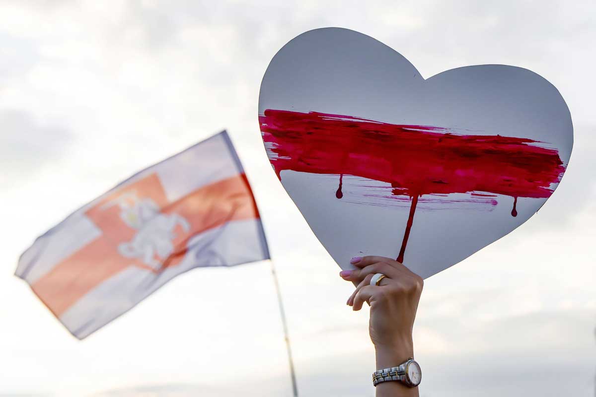 A protester’s symbol of opposition in Belarus, 2020. Piotr Piatrouski/Alamy. 