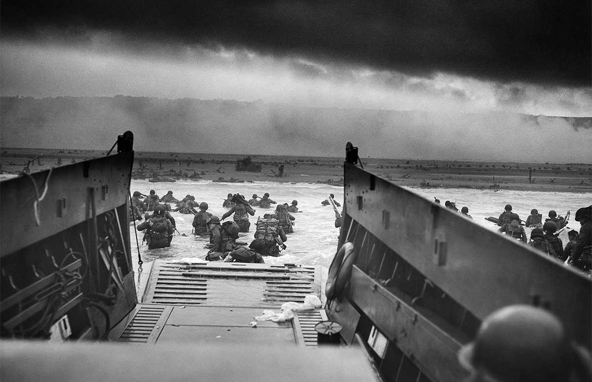 Taxis to Hell – and Back – Into the Jaws of Death, by Robert F. Sargent, a chief photographer's mate in the United States Coast Guard, depicts the US 1st Infantry Division disembarking at Omaha Beach, 6 June 1944.