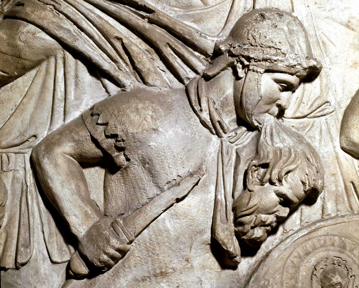 Roman warrior holding the head of an enemy between his teeth, cast from Trajan’s Column, 1862. 