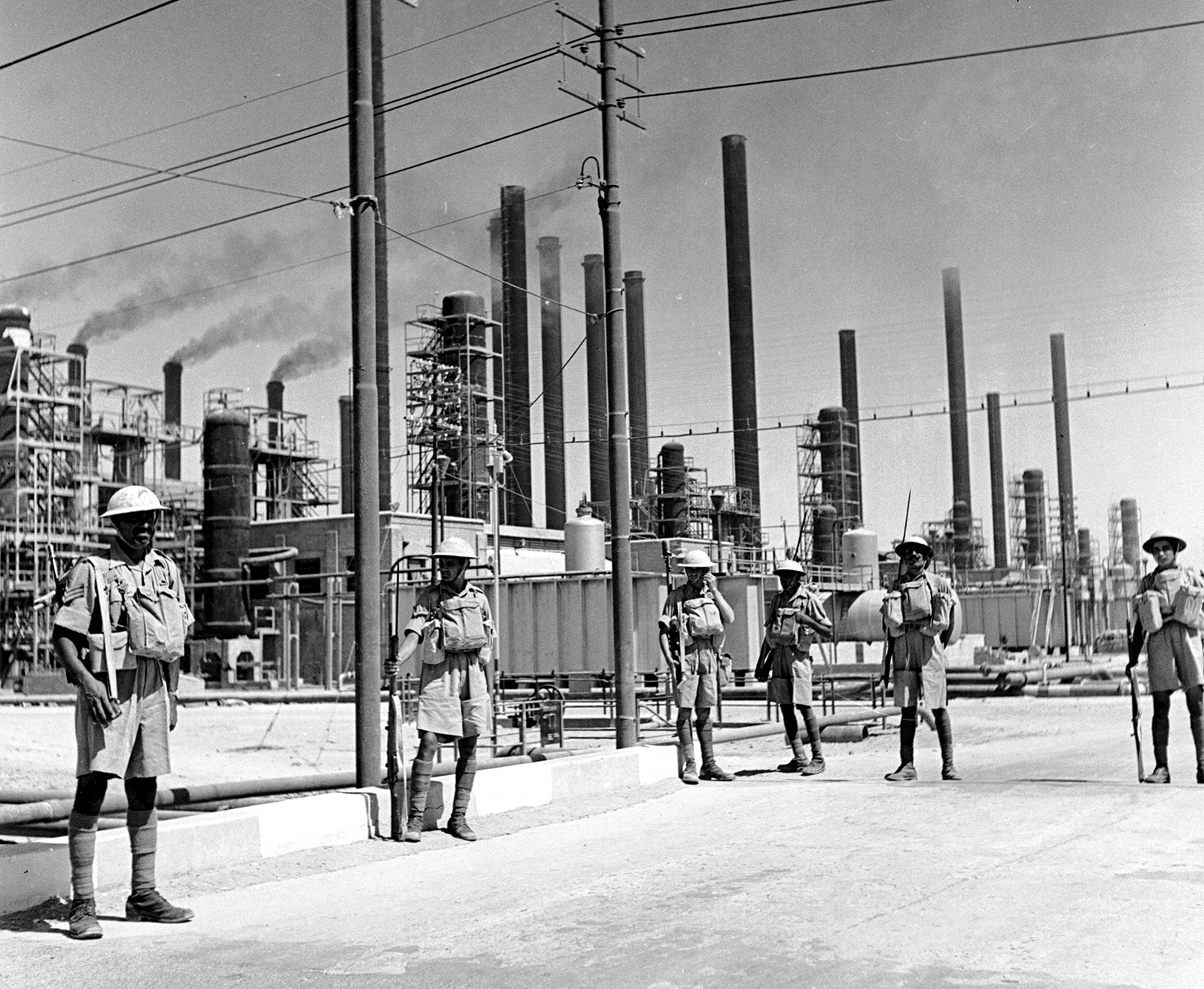 Indian riflemen guard a refinery belonging to the Anglo-Iranian Oil Company, 1940s.