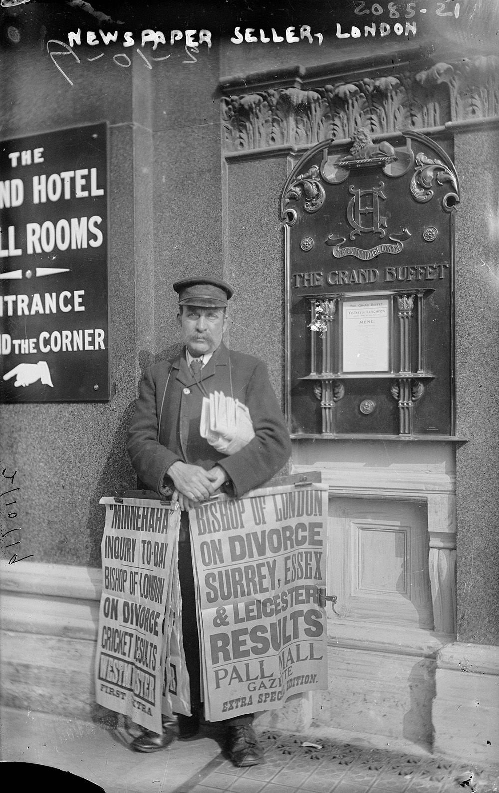 Newspaper seller, London, 1900. George Grantham Bain Collection.