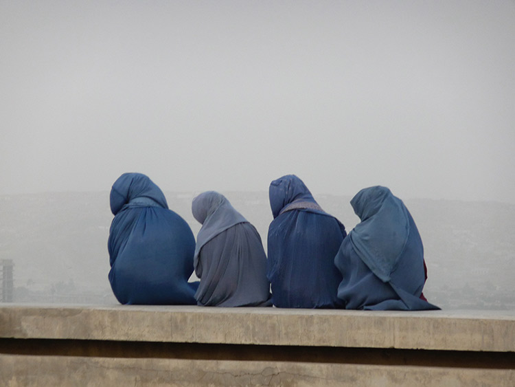 Young women gazing at Kabul from its hills, c.2014.