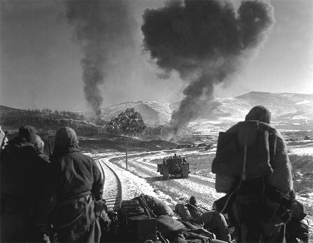 F4U-5 Corsairs provide close air support to U.S. Marines fighting Chinese forces, December 1950.