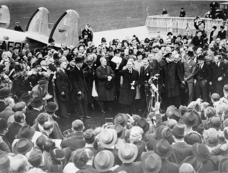 Neville Chamberlain announcing "Peace in our Time" on his arrival at Heston Airport, 30 September 1938.