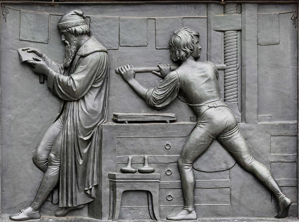 Bronze relief panel from the Gutenberg Monument in Mainz, by David d’Angers, 1840. Bronze relief panel from the Gutenberg Monument in Mainz, by David d’Angers, 1840.