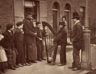 Italian street musicians in London, by John Thomson, 1877. J. Paul Getty Museum. Public Domain.