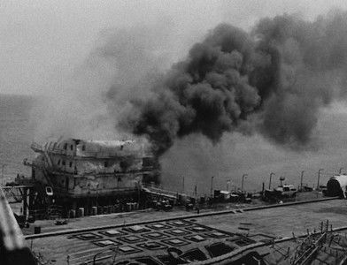 An Iranian oil platform burns after being hit by the US Navy in retaliation for the mining of USS Samuel B. Roberts, 18 April 1988. National Archives and Records Administration. Public Domain.