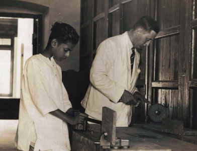 Maharajah Chithira Tirunal and G.T.B. Harvey having a carpentry lesson, c.1930. Archive of Modern Conflict.