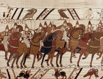 The Normans advance in battle.