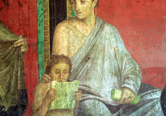 Detail from a fresco showing a young girl reading, from the Villa of Mysteries in Pompeii, first century BC. © Alamy.