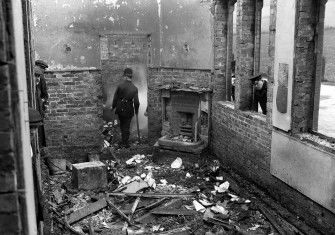 Police survey Saunderton Railway Station after a suffragette arson attack, March 9th, 1913. (Press Association Images)