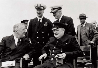 Roosevelt and Churchill seated on the quarterdeck  of HMS Prince of Wales,  10 August 1941. 