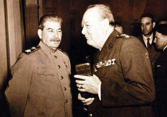 Yalta Conference (Crimea), February 4 to 11, 1945. Onboard warship during the Crimean Conferences at Yalta, Russia. Prime Minister Winston S. Churchill with Marshall Joseph Stalin. U.S. Navy Photograph, now in the collections of the National Archives. (2016/03/22).