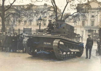 A military show of force during the unrest in the form of a tank and troops from Wellington Barracks. Press Photo.