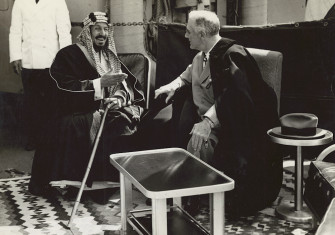 King Ibn Saud of Saudi Arabia and President Franklin D. Roosevelt converse on the deck of a U.S. warship in the Great Bitter Lake near Cairo after Roosevelt's attendance at the Yalta conference.