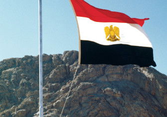 Anwar Sadat raises the Egyptian flag over Sinai, 26 May 1979.