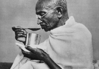 Mahatma Gandhi eats in preparation for a fast, c. 1940. Dutch National Archives (CC0).