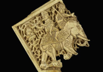 An Egyptian ivory plaque showing two figures riding an elephant, c. 11th-12th century. Walters Art Museum (CC0).
