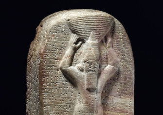 Stone stela of Ashurbanipal inscribed with cuneiform commemorating his building work on the Temple of Marduk in Babylon. Trustees of the British Museum.