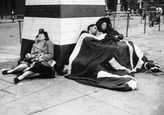 Londoners sleep through the early hours of the morning after a night of celebrations, 8 May 1945. Mirrorpix.