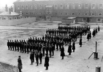 A parade by young inmates at Feltham Borstal, Middlesex, 1911. PA Photos/TopFoto.