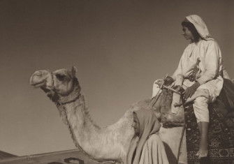Arabian American Oil Co drilling rig in the desert, Saudi Arabia, by Robert Yarnall Richie, 1948. DeGolyer Library, Southern Methodist University. Public Domain.