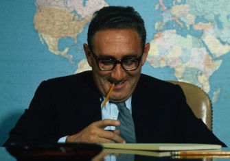 Henry Kissinger poses for a portrait in the Situation Room in the basement of the West Wing at the White House, Washington, DC, 1969. Photo © Wally McNamee/CORBIS/Getty Images.