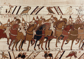 The Normans advance in battle.