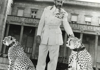 Haile Selassie with his pet cheetahs before the Jubilee Palace, Addis Ababa, c.1955.