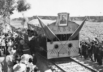 Blood on the tracks: a portrait of Mao adorns a freight train in Yuhsien County, Shansi Province, May 5th, 1958.