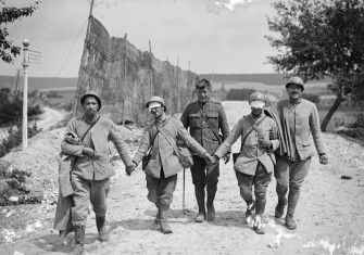 Holding the line: French soldiers blinded by gassing at the Marne, 1918.