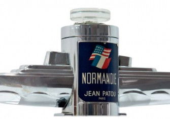 A chrome bottle of perfume in the shape of SS Normandie housed a scent created by Jean Patou, 1935.