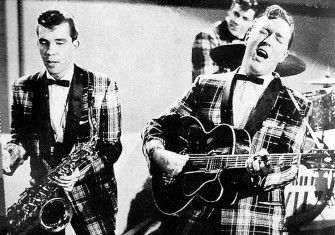 Bill Haley and his Comets performing "Rock Around the Clock" on TV in 1955