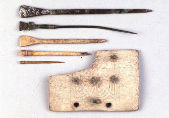 School tools: whale-bone writing-tablet and styluses from the middle Anglo-Saxon period