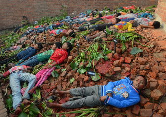 Children re-enact the death of intellectuals during the Liberation War, Dhaka, December 14th, 2013