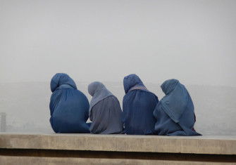 Young women gazing at Kabul from its hills, c.2014.