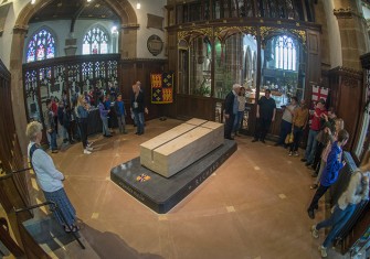 Visitors circulate around Richard's tomb in the chancel.