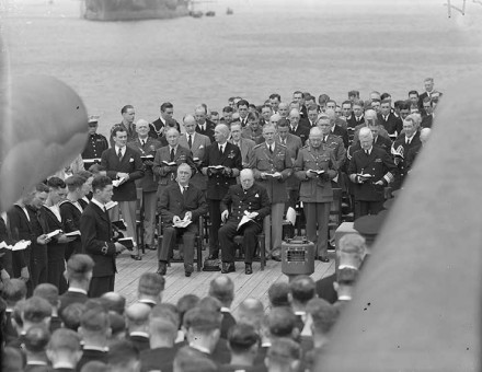 President Roosevelt and Prime Minister Churchill attend a Sunday service on the quarterdeck of HMS Prince of Wales during the Atlantic conference,  10 August 1941.