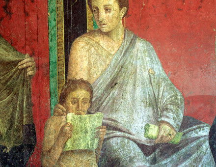 Detail from a fresco showing a young girl reading, from the Villa of Mysteries in Pompeii, first century BC. © Alamy.