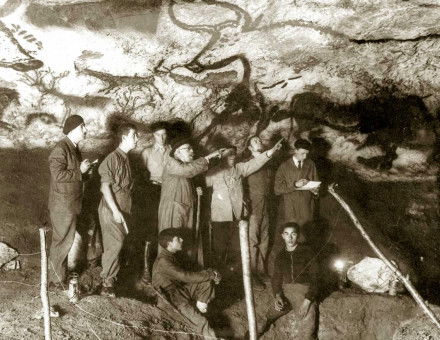 The cave’s discoverers with visitors (Marcel Ravidat, seated right, and Henri Breuil, centre), 1940.