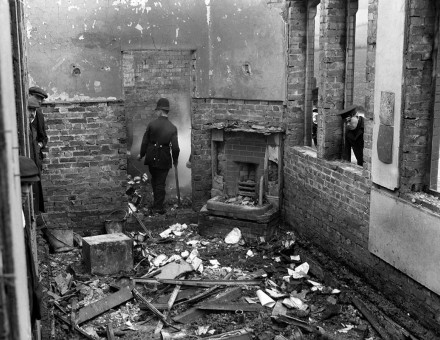 Police survey Saunderton Railway Station after a suffragette arson attack, March 9th, 1913. (Press Association Images)