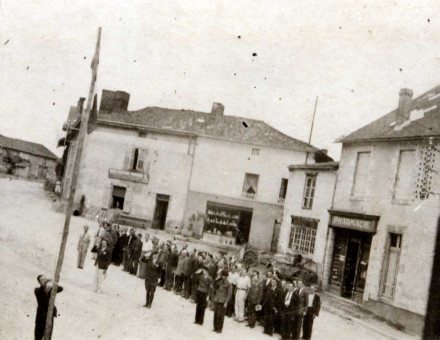 The 643rd GTE of Oradour-sur-Glane raising the colours on the corner of the Champ de foire (1941-42), the site of the 1944 round-up.