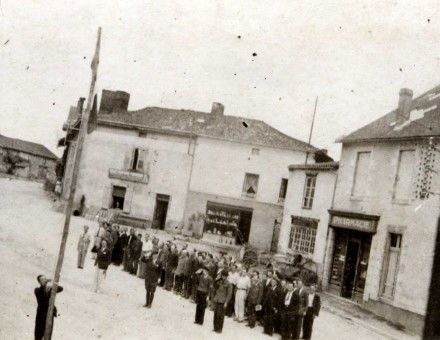 The 643rd GTE of Oradour-sur-Glane raising the colours on the corner of the Champ de foire (1941-42), the site of the 1944 round-up.