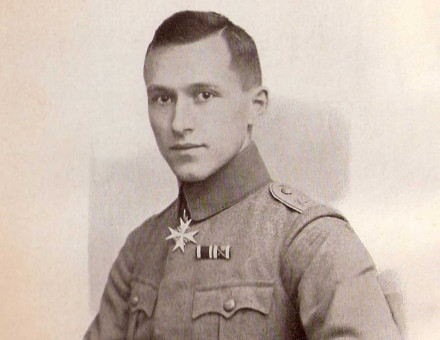 Ernst Jünger showing him in military dress, wearing (top to bottom) the Pour le Mérite, the House Order of Hohenzollern with Swords ribbon (peacetime variant), the Iron Cross and the Wound Badge.